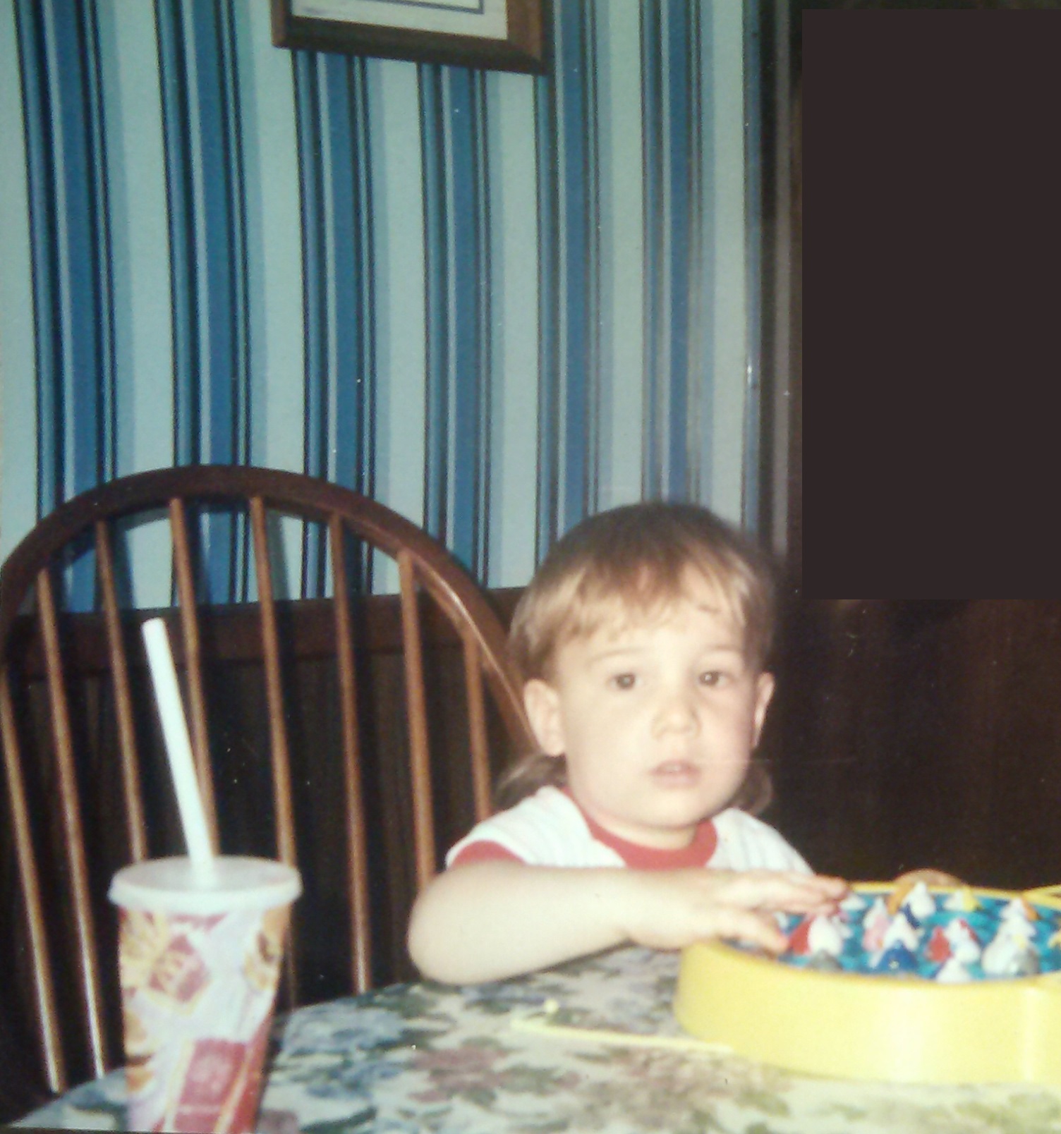 Circa 96 Chay playing that EPIC fishing game we had while eating a HAPPY MEAL (I wonder what the TOY was?!)!